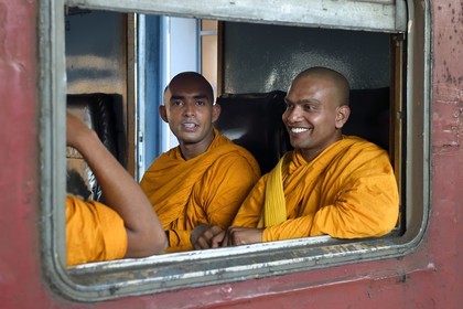 Sri Lanka, Southern Province, buddhist monks in the train from Colombo to Galle