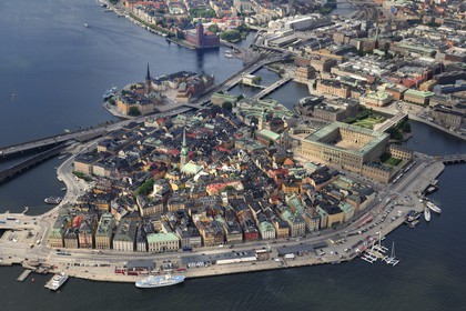 Sweden, Stockholm, Gamla Stan island (old town), the Royal Palace right and behind it the Parliament (aerial view)
