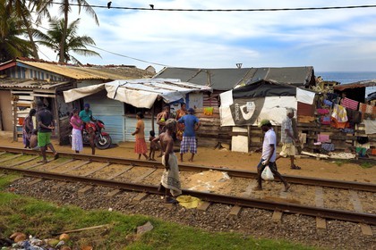 Sri Lanka, Western Province, Colombo, Mount Lavinia, train from Colombo to Galle, makeshift homes along the tracks