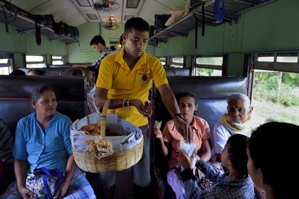 Sri Lanka, Southern Province, train from Colombo to Galle, donuts street vendor
