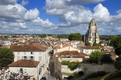 France, Charente-Maritime, Saintonge, Saintes, the rue des Jacobins in the old town and Saint-Pierre cathedral on the right, the Abbaye aux Dames in the background