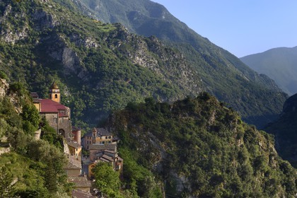 France, Alpes-Maritimes, Roya Valley (Nice hinterland), at the foot of the Mercantour National Park, perched village of Saorge, Saint-Sauveur (St. Saviour) church overlooks the valley