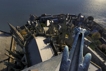 France, Manche, Mont Saint Michel, listed as World Heritage by UNESCO, the church and the village seen from the spire at dawn