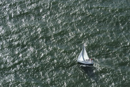 France, Seine Maritime, Le Havre, sailboat off (aerial view)