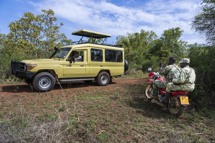 Rwanda, Akagera National Park, four-wheel drive safari, meeting with two park rangers and trackers (Fidel and Dieudonne) responsible for observing and monitoring the movements of rhinos