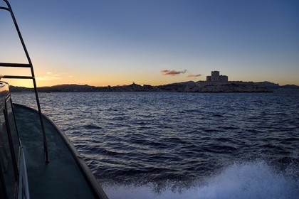 France, Bouches du Rhone, Marseille, Calanques National Park, island of the archipelago of islands of Frioul, Chateau d'If, Notre Dame de la Garde in the background