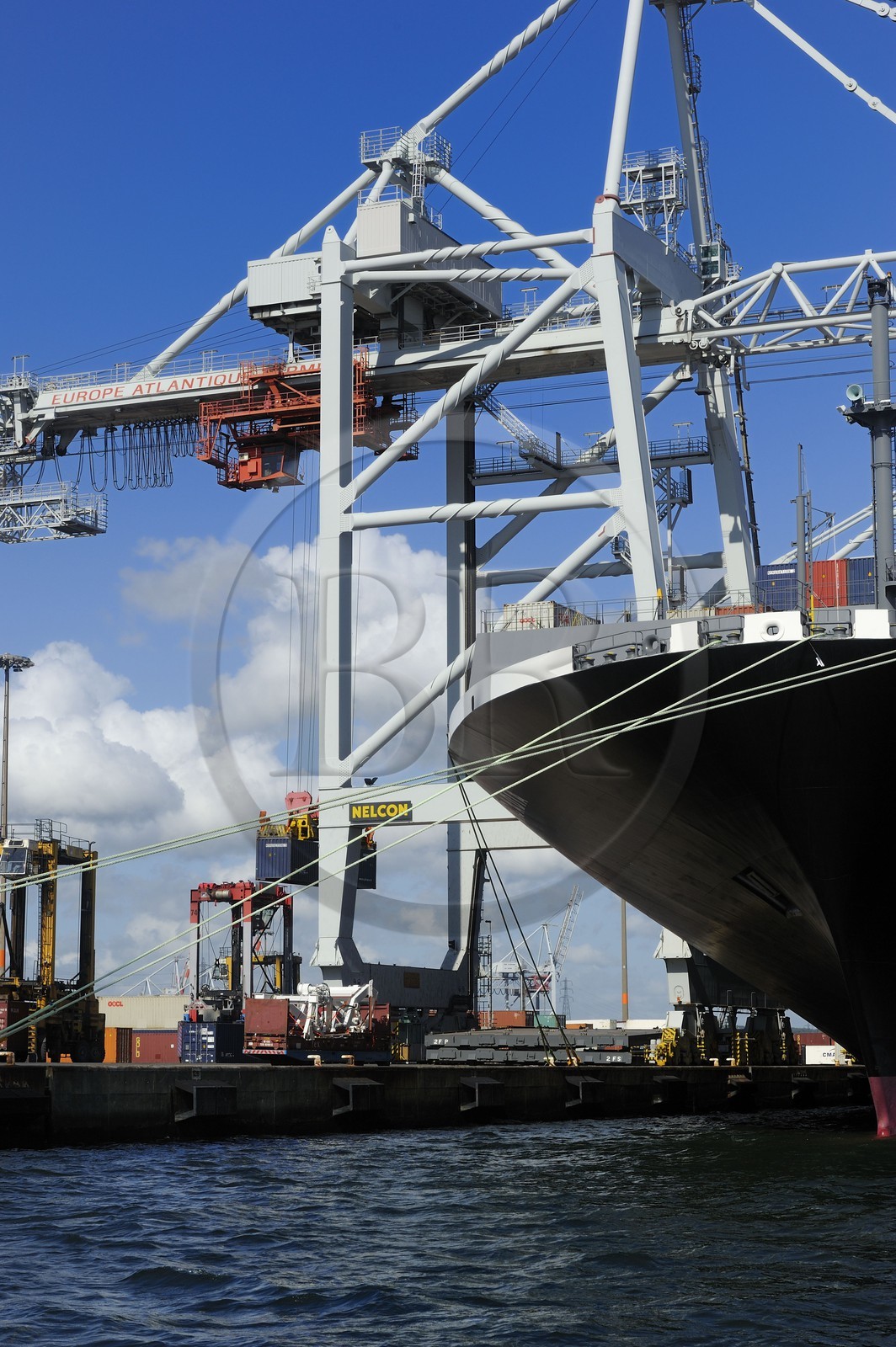 France, Seine Maritime, Le Havre, commercial port, container ship in the Rene Coty docking basin and cranes