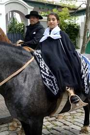 Argentina, Buenos Aires Province, San Antonio de Areco, Tradition Day festival (Dia de Tradicion), young girl in pancho