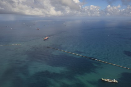 Panama, Colon province, the Limon Bay (Bahia Limon) in the Caribbean Sea at the output of the Panama Canal on the Atlantic side provides anchorage for ships waiting to transit (aerial view)
