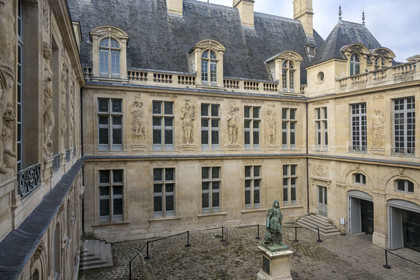 France, Paris, Marais district, Carnavalet Museum, full-length statue of Louis XIV in the court of honor, work of Antoine Coysevox