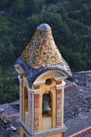 France, Alpes-Maritimes, Roya Valley (Nice hinterland), at the foot of the Mercantour National Park, Saorge, glazed tiles bell tower of the chapel Saint Jacques of the White Penitents