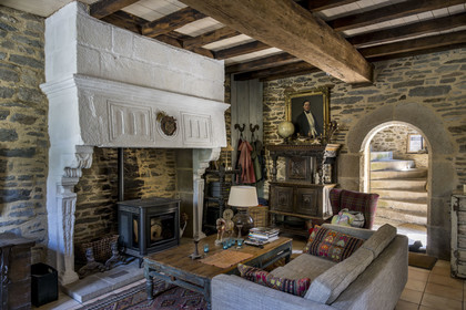 France, Finistère, Roscoff, shipowner's house called la Porte Noire (the Black Gate) built at the end of the 16th century by the James brothers and belonging today to Christian Kulig, the living room in the old walking space with a ceremonial fireplace