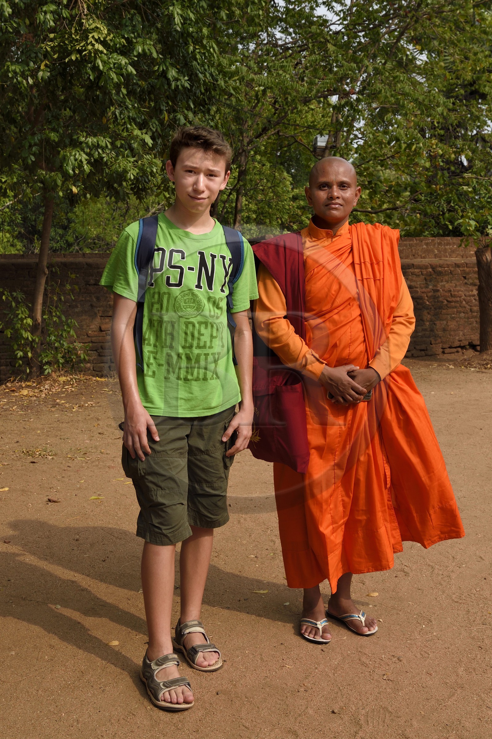 Sri Lanka, North Central province, Polonnaruwa, the former capital of the country (11th to 13th century) listed as World Heritage by UNESCO, Paul and a Buddhist Nun