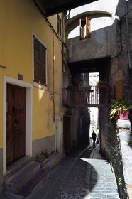 France, Alpes-Maritimes, Roya Valley (Nice hinterland), at the foot of the Mercantour National Park, Saorge, the lane Carera Medge that passes under a pountin (small bridge)