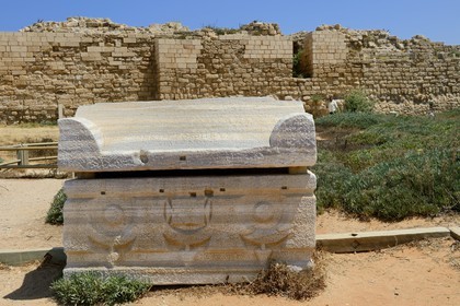 Israel, Haifa District, Caesarea (Caesarea Maritima), ruins of Caesarea, sarcophagus in front of the outside walls of the Herode the Great palace