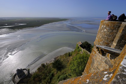 France, Manche, Mont Saint Michel, listed as World Heritage by UNESCO, view over the polders and salt marshes as well as the bay at low tide from the west platform