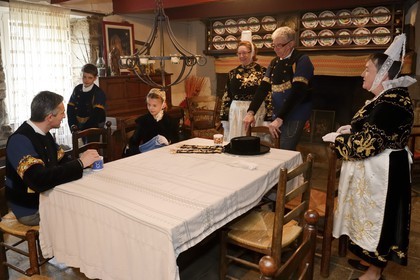 France, Finistere, Locronan, labelled Les plus Beaux Villages de France (The Most Beautiful Villages of France), final preparations in traditional costumes the morning of the procession of the small Troménie in the Louboutin family farm