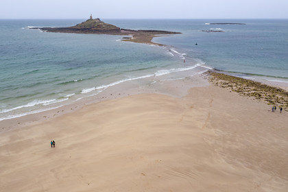 France, Cotes d'Armor, Grand Site de France Cap d'Erquy - Cap Frehel, Erquy, the Saint-Michel islet topped by the Saint-Michel chapel accessible on foot at low tide, passage of the tombolo at rising tide (aerial view)