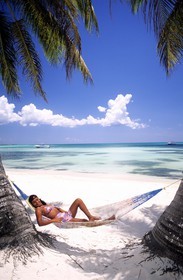 Dominican Republic, Del Este national park, young Dominican women resting on the beach
