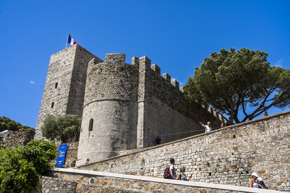 France, Alpes-Maritimes, Cannes, the old town in the Le Suquet district, at its summit the Chateau de la Castre and the Suquet Tower