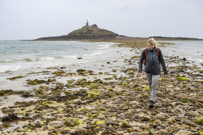 France, Cotes d'Armor, Grand Site de France Cap d'Erquy - Cap Frehel, Erquy, the Saint-Michel islet topped by the Saint-Michel chapel accessible on foot at low tide via a tombolo