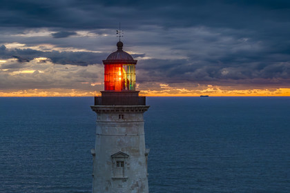 France, Gironde, Verdon sur Mer, lighthouse of Cordouan, listed as World Heritage by UNESCO, lighthouse keeper Nicolas Quezel-Guerraz is in the lantern whose light illuminates the horizon at nightfall (aerial view)
