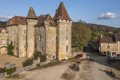 France, Dordogne, Périgord Vert, Saint Jean de Cole, labelled Les Plus Beaux Villages de France (The Most Beautiful Villages of France), cyclists traveling along the Flow Vélo cycle route in front of the Marthonye or Marthonie castle (aerial view)