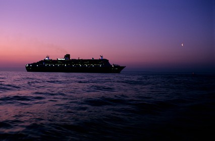 France, Manche, the transatlantic Queen Mary II at dawn