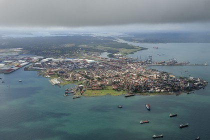 Panama, Colon province, the city of Colon in the Limon Bay (Bahia Limon) at the output of the Panama Canal on the Atlantic side in the background right, the vast warehouses locate the Colon Free Trade Zone (aerial view)