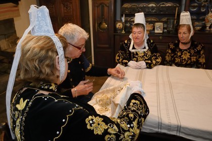 France, Finistere, Locronan, labelled Les plus Beaux Villages de France (The Most Beautiful Villages of France), adjustment of the traditional costumes the morning of the procession of the small Troménie in the Louboutin family farm