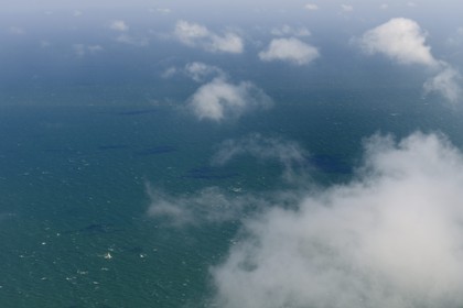 United Kingdom, England, sailboat sailing in the English Channel (aerial view)
