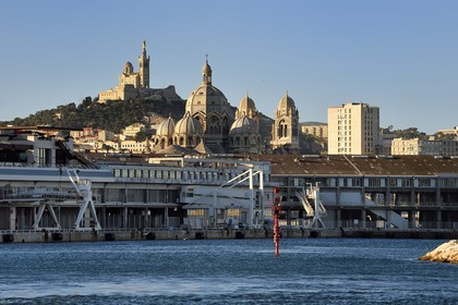 France, Bouches du Rhone, Marseille, Euroméditerranée Zone, Great Seaport of Marseille, La Major Cathedral (19th century) and Notre Dame de la Garde basilica in the background