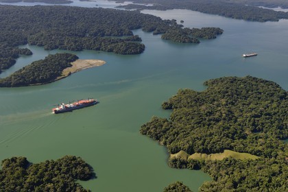 Panama, Panama Canal, Panamax cargo and small islands on Gatun Lake (aerial view)