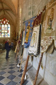 France, Finistere, Locronan, labelled Les plus Beaux Villages de France (The Most Beautiful Villages of France), the banners of neighboring parishes in Peniti chapel adjacent to the Saint Ronan church during the religious ceremony that precedes the procession of the Tromenie