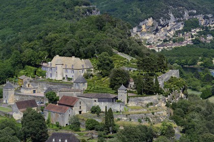 France, Dordogne, Perigord Noir, Dordogne Valley, Vezac, park and castle Marqueyssac of the 18th century, the village of La Roque-Gageac in the background (aerial view)