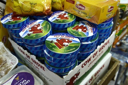 Israel, Jerusalem, holy city, the old town listed as World Heritage by UNESCO, copy of The Laughing Cow cheese on sale in the Khan El-Zeit in the Muslim Quarter