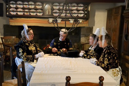 France, Finistere, Locronan, labelled Les plus Beaux Villages de France (The Most Beautiful Villages of France), adjustment of the traditional costumes the morning of the procession of the small Troménie in the Louboutin family farm