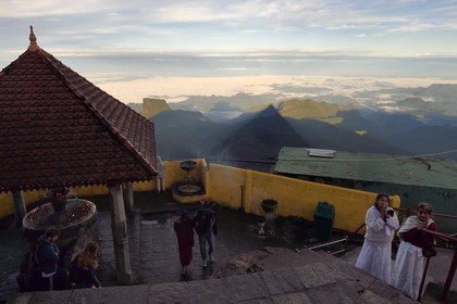 Sri Lanka, center province, Dalhousie, sunrise on Adam's peak, triangle shadow of the peak reflects on the morning haze