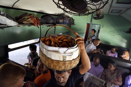 Sri Lanka, Colombo, Colombo Fort train station, fried shrimps and wade street vendor