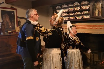 France, Finistere, Locronan, labelled Les plus Beaux Villages de France (The Most Beautiful Villages of France), adjustment of the traditional costumes the morning of the procession of the small Troménie in the Louboutin family farm