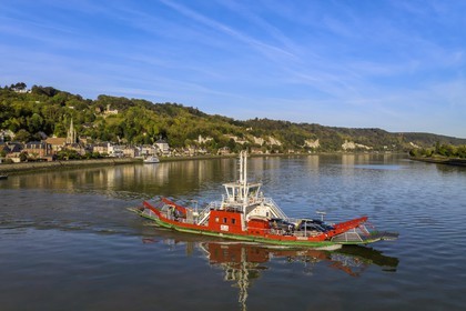 France, Seine-Maritime, Norman Seine River Meanders Regional Nature Park, the ferry crossing the Seine river at the village of La Bouille (aerial view)