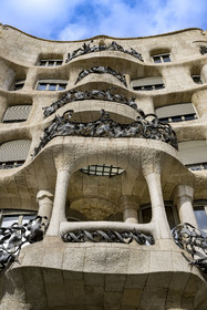 Spain, Catalonia, Barcelona, Eixample district, Passeig de Gracia, Pedrera or Casa Mila (1905-1910) by the Catalan modernist architect Antoni Gaudi, UNESCO World Heritage site, wrought iron balcony and balustrade