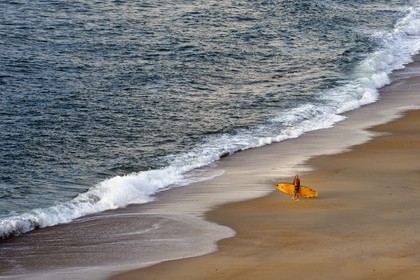 France, Pyrenees Atlantiques, Basque Country, Biarritz, surfer on the Grande Plage (town's largest beach)