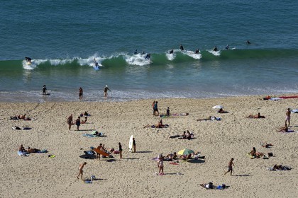 France, Pyrenees Atlantiques, Basque Country, Biarritz, young surfers on the Ilbarritz beach
