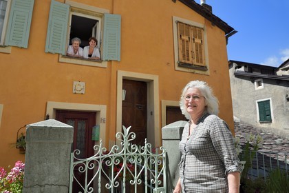 France, Alpes-Maritimes, Roya Valley (Nice hinterland), at the foot of the Mercantour National Park, Saorge, two inhabitants of the village in discussion with Mrs. Bresque, Mayor of Saorge