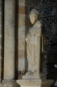 France, Manche, the abbey of Mont Saint Michel, listed as World Heritage by UNESCO, Abbey Church, statue made of granite of the founder of the Abbey, the archbishop of Avranche, Saint Aubert