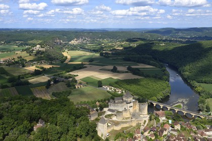 France, Dordogne, Perigord Noir, Dordogne Valley, Castelnaud la Chapelle, labelled Les Plus Beaux Villages de France (The Most Beautiful Villages of France), Castelnaud Castle on a cliff above the Dordogne valley (aerial view)