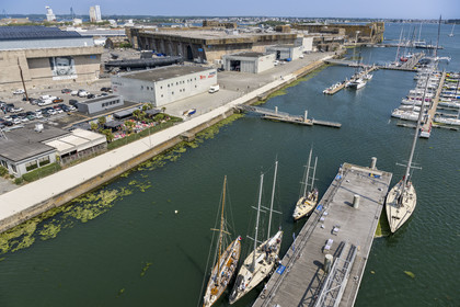 France, Morbihan, Lorient, Lorient La Base, former submarine base built by the Germans during the Second World War,  Cité de la Voile Eric Tabarly, the port of the 5 Pen Duick, Eric Tabarly's boats arrive on the pontoons