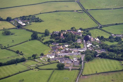 United Kingdom, England, Somerset, Ashbrittle, a 3000 year old Yew tree (Taxus baccata) in the village is among the Great British Trees (aerial view)