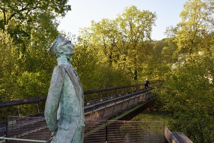 France, Charente, Angouleme, Corto Maltese, bronze sculpture by Luc and Livio Benedetti, on the Hugo Pratt footbridge over the Charente river which connects the buildings of the Cité internationale de la bande dessinée et de l’image (CIBDI)(International city of comics and images)